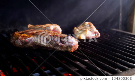 Steakhouse. Steaks are roasted on a Josper oven. Frying a steak on a josper. 134800308