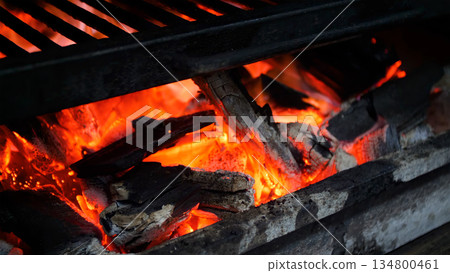 Steakhouse. Steaks are roasted on a Josper oven. Frying a steak on a josper. Steakhouse. Steaks are roasted on a Josper oven. Frying a steak on a josper. 134800461