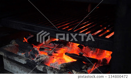 Steakhouse. Steaks are roasted on a Josper oven. Frying a steak on a josper. 134800472