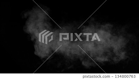 Realistic smoke effect, breathe out. drifting and spreading in freeze motion against a black background. Cinematic atmospheric fog ideal for VFX compositing, overlays, transitions, and moody visual 134800763
