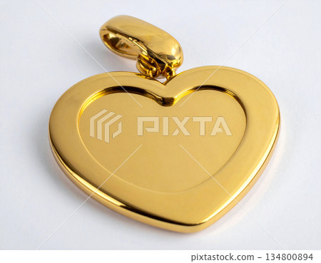 Button badge.  Metal heart-shaped keychain on white background. 134800894