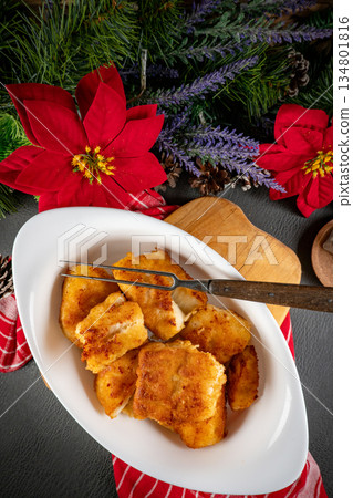 Pieces of cod fillet fried in breadcrumbs. 134801816