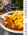 Beef roulade with baked potatoes. 134801819