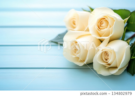 Bouquet of white roses on blue wooden background 134802979
