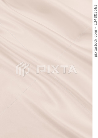 Smooth elegant golden silk or satin luxury cloth texture as wedding background. Luxurious background design. In Sepia toned. Retro style 134803563