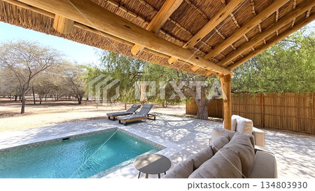 Luxury Outdoor Sanctuary, Refined Patio With Sweeping Views Of Natural Landscape And Waterways, Sophisticated Openair Lounge Offering Tranquil Vistas Of Distant Nature Preserves And Flowing Waters 134803930