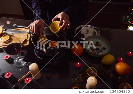 Winter Mulled Wine Prep With Citrus, Candles, And Cozy Holiday Vibes Winter Mulled Wine Prep With Citrus, Candles, And Cozy Holiday Vibes 134804850