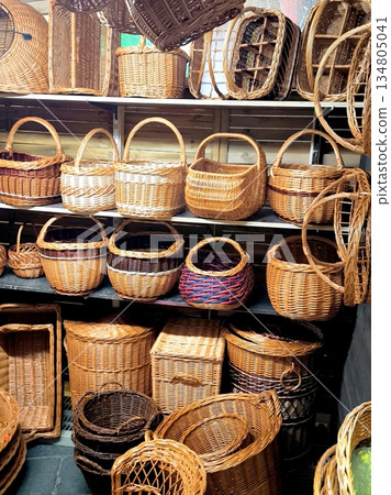 A variety of handmade wicker baskets and boxes 134805041
