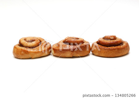 Cinnamon roll on white background Cinnamon roll on white background 134805266
