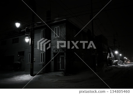 Cityscape at night with snow Cityscape at night with snow 134805460