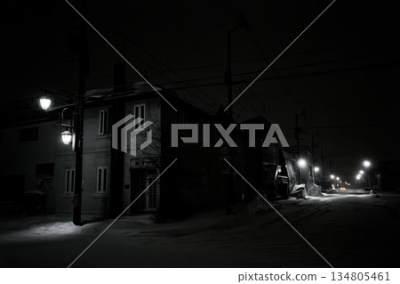 Cityscape at night with snow Cityscape at night with snow 134805461