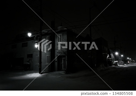 An emergency exit floating in the darkness of the night 134805508