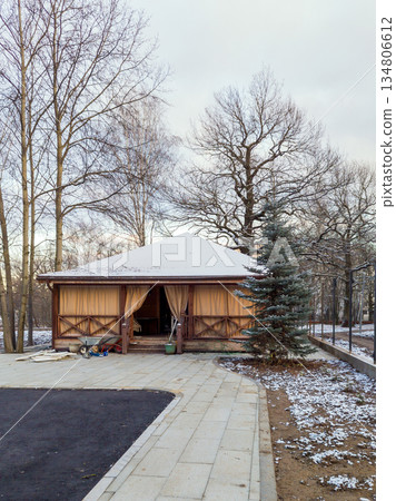 Wooden Church Refectory Under Construction in Orthodox Parish Yard 134806612