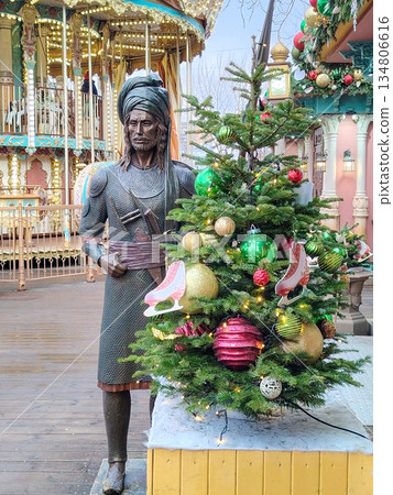 Indian Warrior Statue with Decorated Christmas Tree at Moscow Seasons Fair 134806616