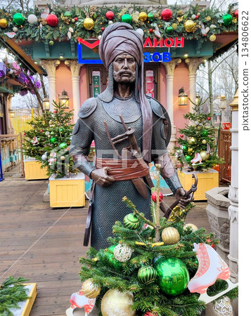 Indian Warrior Statue with Bow at Moscow Seasons Festival Fair Indian Warrior Statue with Bow at Moscow Seasons Festival Fair 134806622