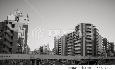 A monochrome urban landscape of a residential area seen from the Oji-Kamiya footbridge A monochrome urban landscape of a residential area seen from the Oji-Kamiya footbridge 134807448