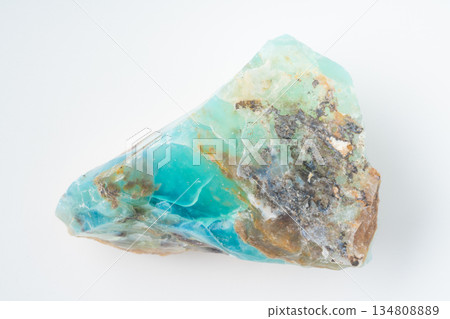 Blue opal rough on white background Blue opal rough on white background 134808889