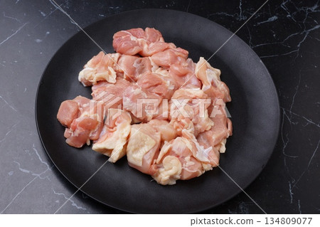 Domestic raw chicken thighs Domestic raw chicken thighs 134809077