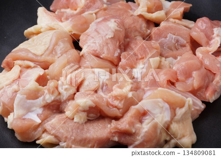 Domestic raw chicken thighs 134809081