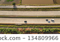 Aerial view of street in Bangkok Thailand with cars and countryside 134809966