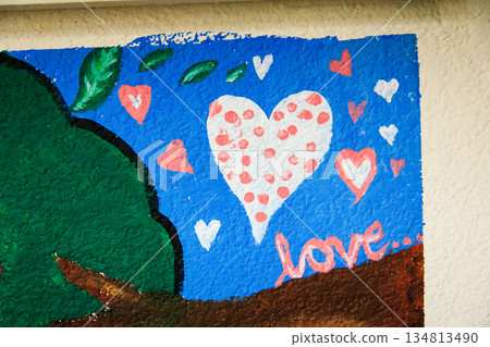 colorful felt letter block with a pattern of hearts colorful felt letter block with a pattern of hearts 134813490