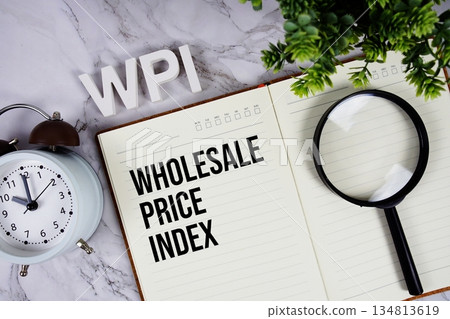 WPI - Wholesale Price Index acronym on notepad, Business concept background WPI - Wholesale Price Index acronym on notepad, Business concept background 134813619