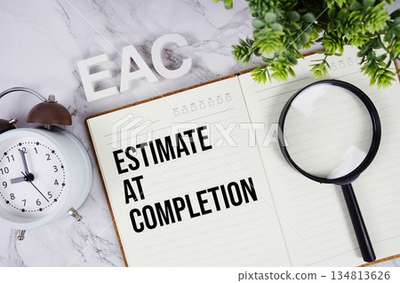 EAC - Estimate At Completion acronym on notepad, Business concept background EAC - Estimate At Completion acronym on notepad, Business concept background 134813626