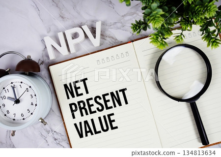 NPV - Net Present Value acronym on notepad, Business concept background 134813634