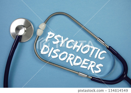 Psychotic Disorders text with stethoscope on blue background Psychotic Disorders text with stethoscope on blue background 134814549