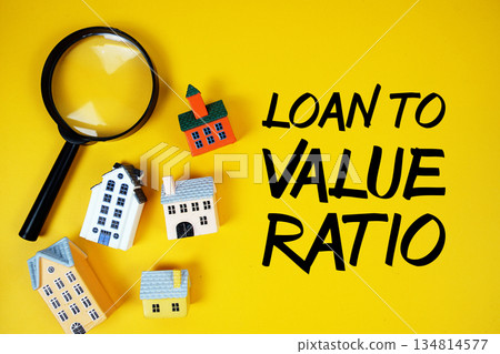 LTV Loan-to-Value Ratio text with house models and magnifying glass on yellow background LTV Loan-to-Value Ratio text with house models and magnifying glass on yellow background 134814577