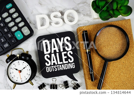 DSO - Days Sales Outstanding acronym with calculator, alarm clock and magnifying glass, Business concept background DSO - Days Sales Outstanding acronym with calculator, alarm clock and magnifying glass, Business concept background 134814644