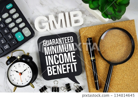 GMIB - Guaranteed Minimum Income Benefit acronym with calculator, alarm clock and magnifying glass, Business and Financial concept background GMIB - Guaranteed Minimum Income Benefit acronym with calculator, alarm clock and magnifying glass, Business and Financial concept background 134814645