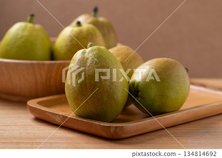 Fresh pear on wooden background 134814692