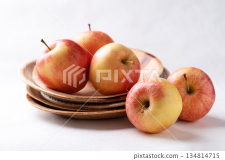 Red apple fruit (Gala apple) in natural plate on white background Red apple fruit (Gala apple) in natural plate on white background 134814715