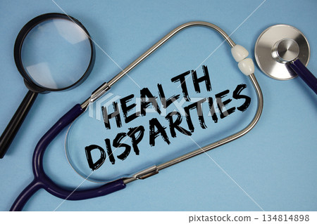 Health Disparities text with Stethoscope and magnifying glass on blue background Health Disparities text with Stethoscope and magnifying glass on blue background 134814898
