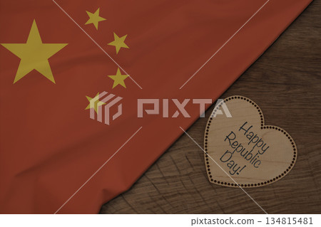 Chinese flag on wooden surface with Happy Republic Day on wooden heart 134815481