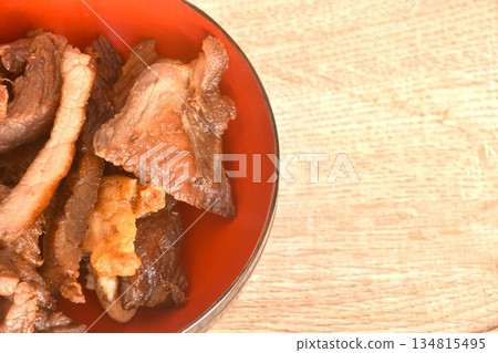 fried crispy salty fermenting beef fat meat with pepper on bowl fried crispy salty fermenting beef fat meat with pepper on bowl 134815495