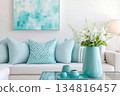 Modern living room design featuring turquoise accents and stylish decor elements for a refreshing ambiance 134816457