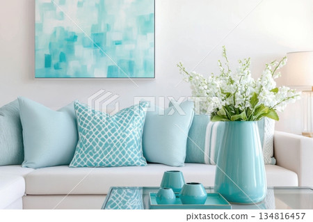 Modern living room design featuring turquoise accents and stylish decor elements for a refreshing ambiance 134816457