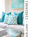 Modern living room featuring turquoise accents and stylish decor elements for a vibrant and inviting atmosphere 134816461