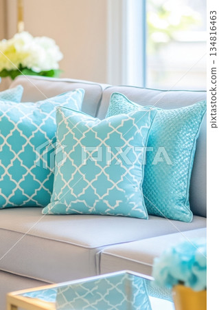 Modern living room featuring turquoise accents and stylish decor for a refreshing and inviting atmosphere Modern living room featuring turquoise accents and stylish decor for a refreshing and inviting atmosphere 134816463