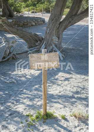 Wooden eco-zone sign with no littering message Wooden eco-zone sign with no littering message 134817421