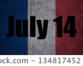 French flag on textured plaster wall with text July 14. Bastille Day 134817452