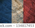 French flag on background of textured stone with artistic patterns. Patriotic background 134817453