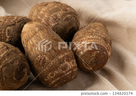 Close-up of taro (Tsuchita) placed on a cloth 134820174