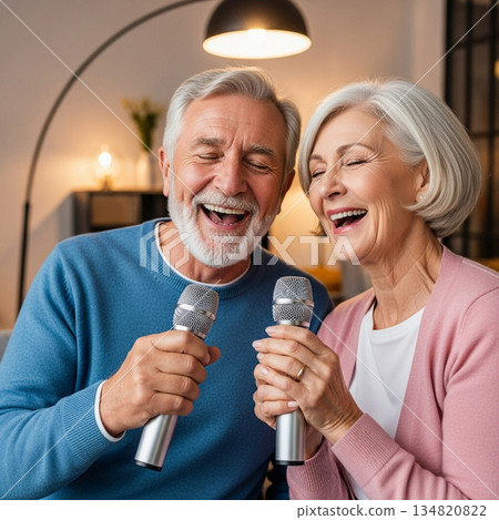Elderly man and woman singing karaoke together in a cozy modern living room Elderly man and woman singing karaoke together in a cozy modern living room 134820822