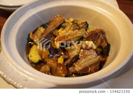 Chinese cuisine: Pork cheek, eggplant and zucchini stir-fried with black vinegar Chinese cuisine: Pork cheek, eggplant and zucchini stir-fried with black vinegar 134821330