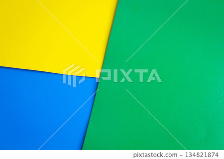Multicolored background. Three colors on paper.Rainbow paper. Multicolored background. Three colors on paper.Rainbow paper. 134821874