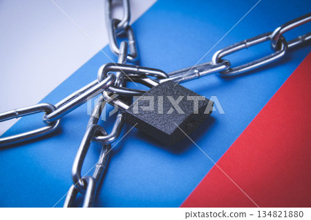 Flag of Russia and a chain with a lock. Country blocking. Prohibited. Flag of Russia and a chain with a lock. Country blocking. Prohibited. 134821880