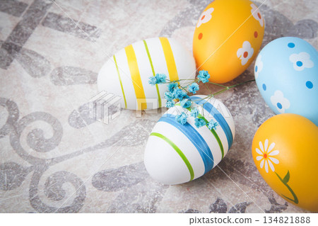 Easter. Multicolored eggs. Yellow and blue Easter decorations. Easter. Multicolored eggs. Yellow and blue Easter decorations. 134821888